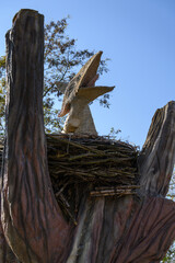 Pteranodon baby in the nest plastic figurine.  © lapis2380