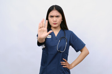 Healthcare workers concept. Serious-looking displeased asian doctor, nurse in scrubs stopping you,...
