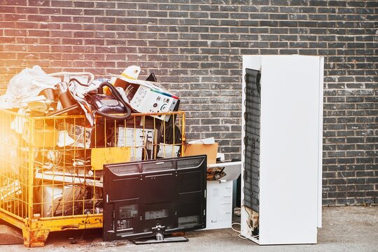 Used electronics collection awaiting recycling at recycling center