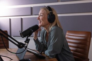 Expert recording a corporate podcast in a studio