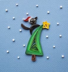 Christmas card, Paper cat on  Christmas tree with star and snow balls, hand made. a naughty cat...