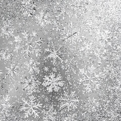 Silver glitter texture with snowflakes creates festive and sparkling winter background. shimmering design evokes sense of holiday cheer and elegance, perfect for seasonal themes
