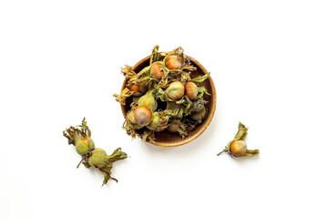 Hazelnut harvest time. Fresh hazelnuts with leafy shells, top view