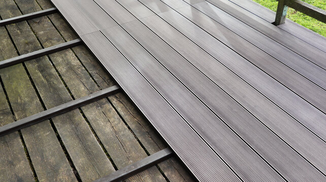 Outdoor plastic composite brown floor. Renovation terrace	