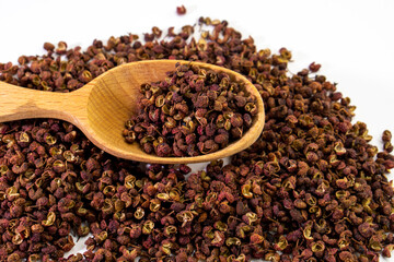 Close up of traditional Chinese spice. Sichuan peppercorns. Sichuan pepper often used in Chinese and Asian cooking for spicy meals. Food concept