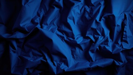 A Deep Blue Fabric with Soft and Gentle Crinkles, Showing Subtle Light and Shadow Play