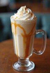 Decadent Caramel Latte with Whipped Cream in Glass Mug on Wooden Table