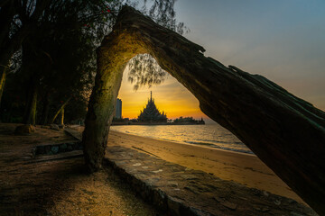 orange sun and wooden castle