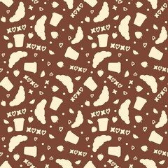 Seamless pattern for Valentine's Day with yellow silhouettes of croissants, coffee cups, lips, strawberries, and hearts on a brown background. Ideal for romantic textiles and wallpapers.