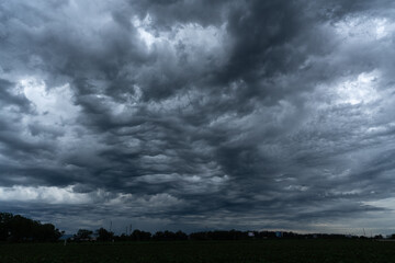 Dark clouds covered the sky