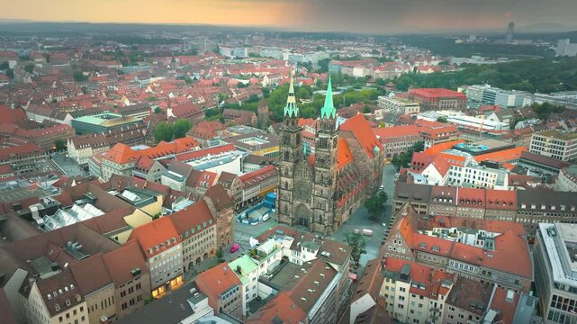 Nuremberg city skyline aerial view drone footage, Germany fly over Lorenzkirche (St. Lawrence Church)