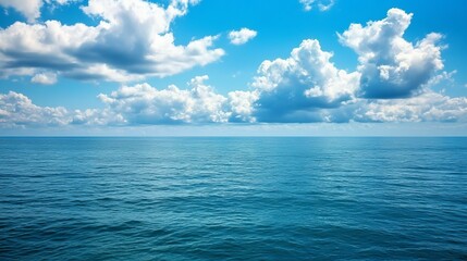 Obraz premium Blue sea ocean water surface and underwater with sunny and cloudy sky,seascape summer background wallpaper.