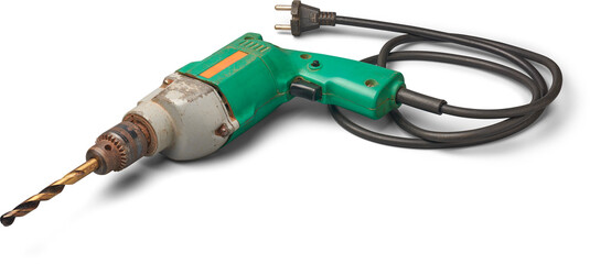 old used metal electric drill with its black wire isolated white background, corded tool with...