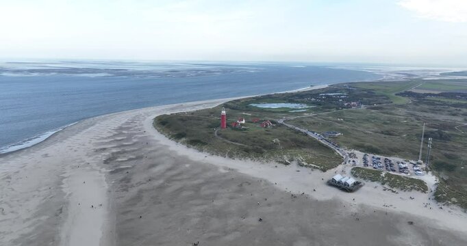 The beach at the north side of the Wadden island, Texel, light house, an aerial drone video