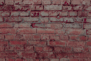 Textured red brick wall. Dilapidated brickwork. Data and property security concept. Grunge surface with traces of abrasions for design. Place for inscription.