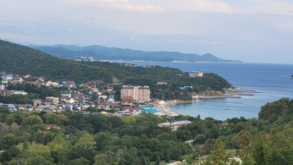 Obraz premium Sea, beach and pebbles, clouds in the sea.