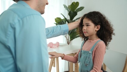 Fototapeta premium Father talking to daughter and explain about generate ai while laptop screen show engineering prompts or coding program. Happy dad checking schoolgirl understanding about writing program. Pedagogy.