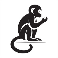 Fototapeta premium Black silhouette of a sitting monkey on a white background