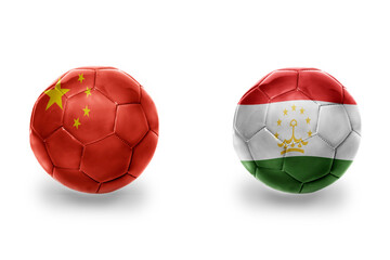 Fototapeta premium football balls with national flags of tajikistan and china ,soccer teams. on the white background.