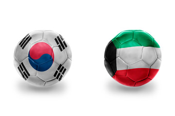 Obraz premium football balls with national flags of kuwait and south korea ,soccer teams. on the white background.