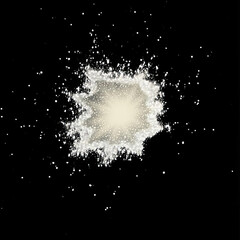 White powder explosion on black background.