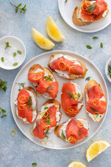Smoked salmon crostini or bruschetta with cream cheese and lox