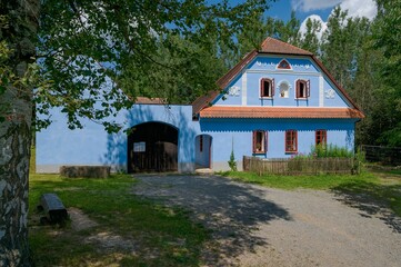 Fototapeta premium A view of the old farm buildings in the open-air museum