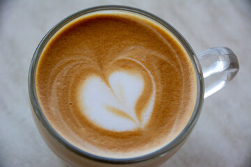 close up veiw on cuppucino in glass cup