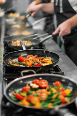 Cooking vegan food in a kitchen