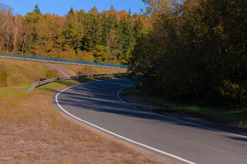 Autumn landscape, road and highway, asphalt and roadside.