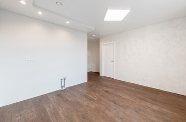 Obraz premium Empty Home Kitchen Interior. White Walls Room. Interior Empty Room with White Walls and Wooden Floor.