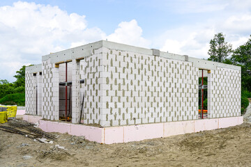 Fototapeta premium Construction site of a new residential house, foundation thermal insulation with polystyrene plates