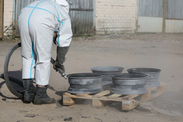 Sandblasting restoration of metal wheel rims, rust removal