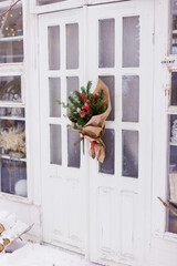 Christmas bouquet with ilex fir tree