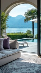 Fototapeta premium A large couch with pillows on it is in front of a pool. The couch is white and has a pattern on it