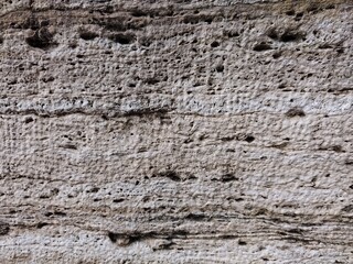 Weathered travertine exterior wall