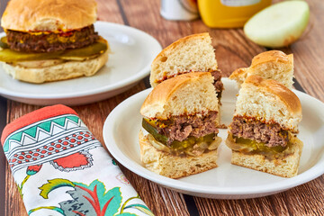 ground venison burger sliders with ketchup, mustard, and pickles