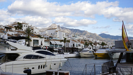 Fototapeta premium Luxury Marina in Puerto Banús with Yachts and Mountain Views