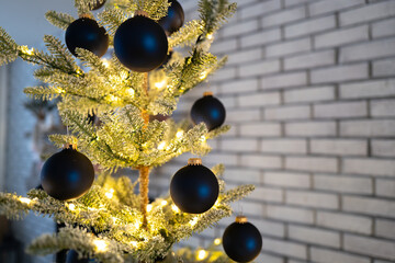 Blue ornaments and white lights bring a Holiday Christmas Tree to Life in a Colonial Luxury Home
