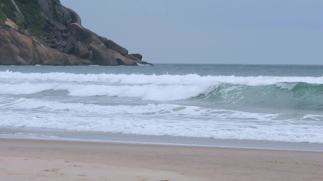 Rough sea at the Tombo beach of Guaruja - SP, Brazil. Beach of the coast of S&atilde;o Paulo state.