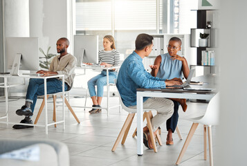 Office, man and woman at laptop for discussion, ideas and collaboration together in coworking...