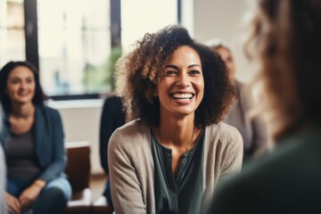 Middle aged female therapist conducting a group session
