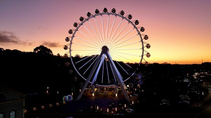 Illuminated Ferris Wheel At Canela In Rio Grande Do Sul Brazil. Colorful Ferris Wheel. Illuminated...