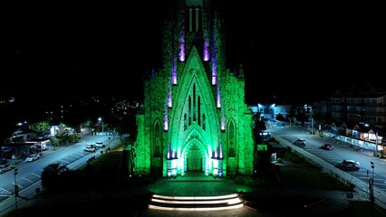 Naklejka premium Canela Brazil. Catholic Church At Canela In Rio Grande Do Sul Brazil. Illuminated Church. Landmark Building. Light Projection Scenery. Catholic Church At Canela In Rio Grande Do Sul Brazil. 