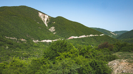 Fototapeta premium Caucasus mountains in Georgia mount Kazbegi travel hiking scenery