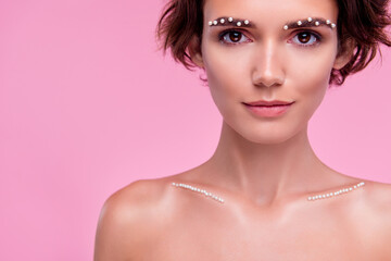 Fototapeta premium Photo of elegant graceful lovely woman wedding make up empty space isolated on pink color background