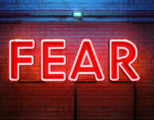 Obraz premium 3d render of red neon letters FEAR on the brick wall