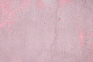 Fototapeta premium Fragment of a rusty grunge surface. Dark red background color. Scuffs and peeling of old paint. Scratches and traces of a welding seam.