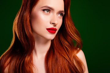 Fototapeta premium Photo of stunning pretty lady with wavy ginger haircut look profile side on green color background