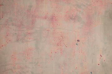 Fragment of a rusty grunge surface. Orange-brown background color. Scuffs and peeling of old paint....